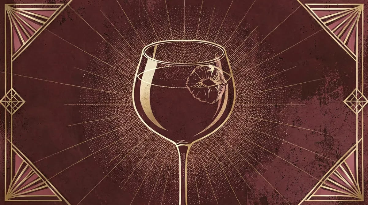 Kit de accesorios de vino sobre mesa de madera: sacacorchos, copa, aireador y termómetro